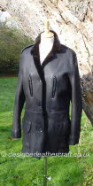 Black Jacket Fastens with Buttons
