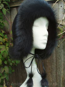 Black Toscana Shearling Hat Worn as a Hood